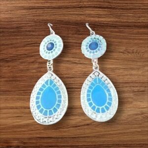 Blue and silver teardrop design dangly earrings